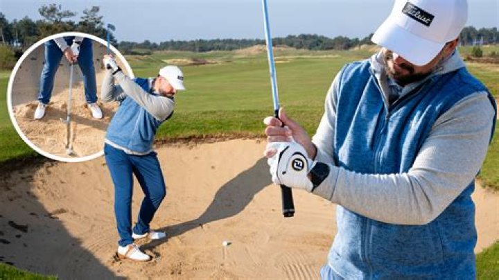 Can a golfer ground his club in a sand trap?