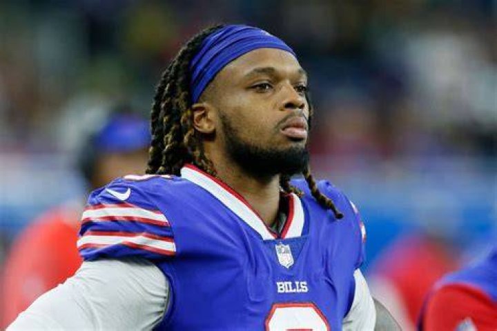 Can a player take his helmet off on the field in the NFL?