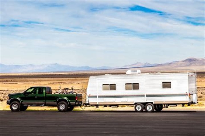 Can an electric truck pull a travel trailer?