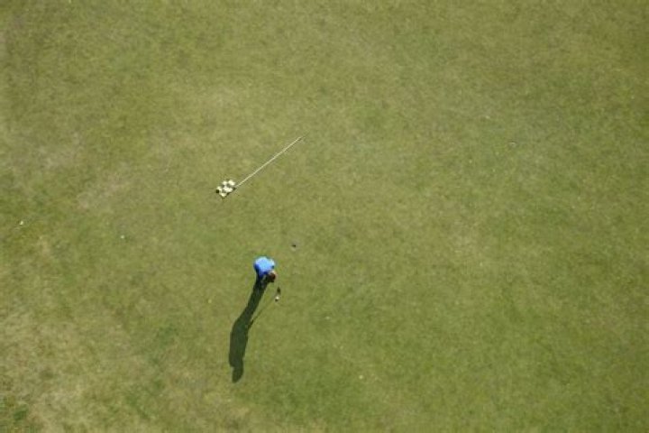 Can golfers use their own caddies at the Masters?