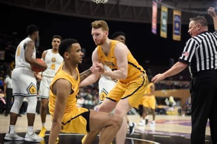 Can you kick a loose ball in basketball?