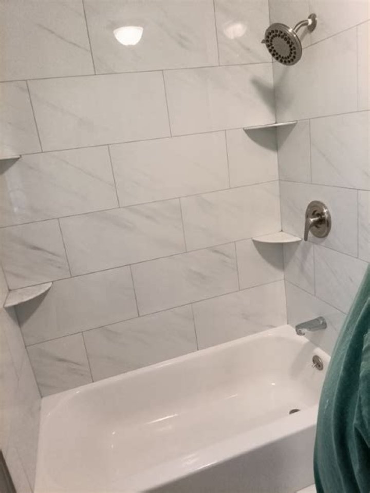 Can you set tile and grout in the same day?