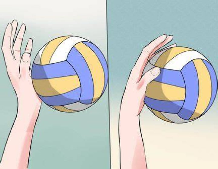 Can you spike a volleyball with 2 hands?