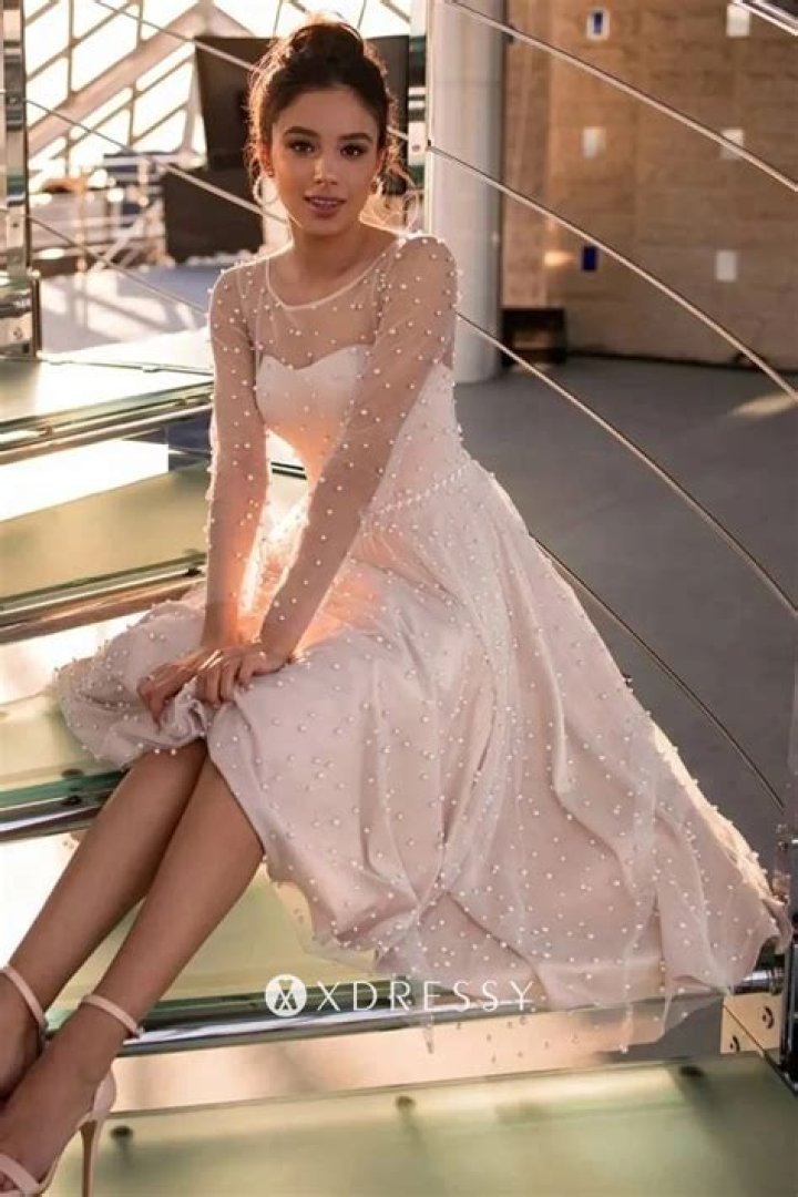 Can you wear a tea length dress to a wedding?