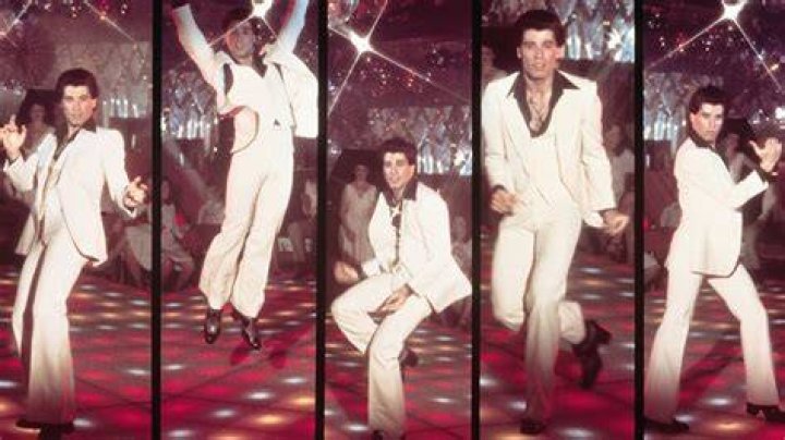 Did John Travolta do his own singing in Grease?