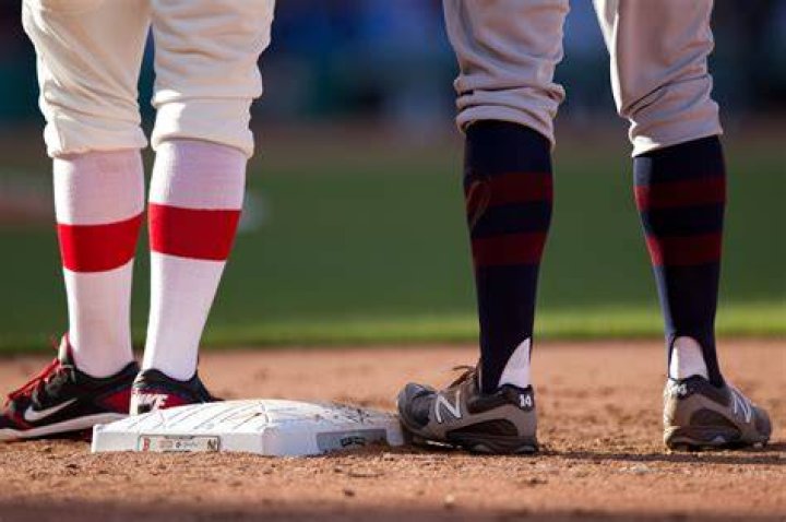 Do baseball players wear high socks?