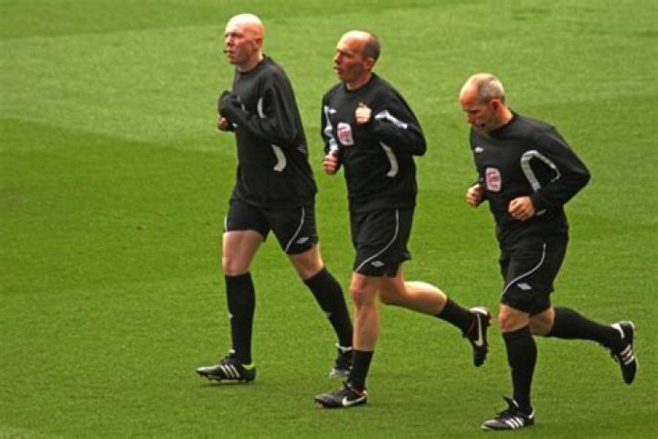 Do soccer referees train?