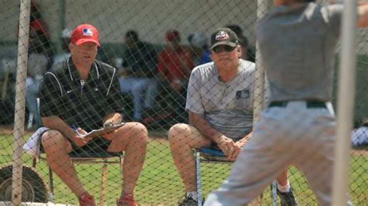 How are baseball scouts paid?