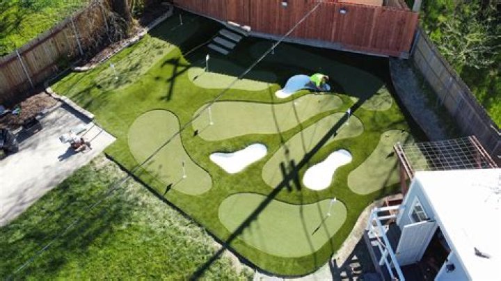 How can I firm up my golf greens?