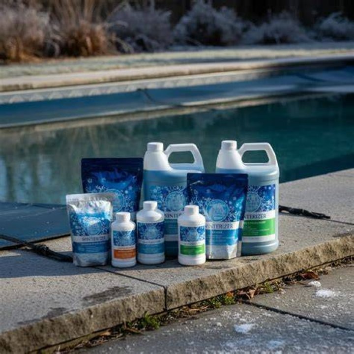 How do I clean my pool liner after winter?