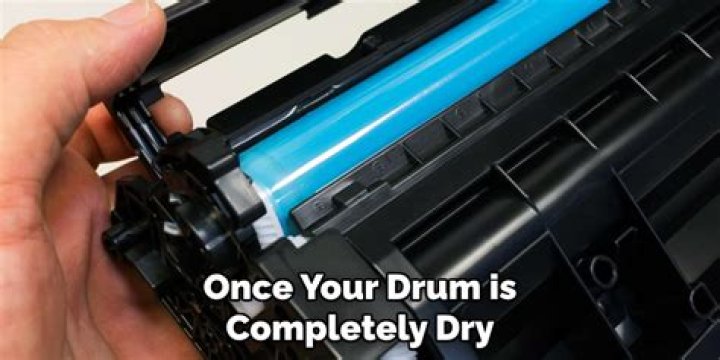 How do I clean the drum on my HP printer?