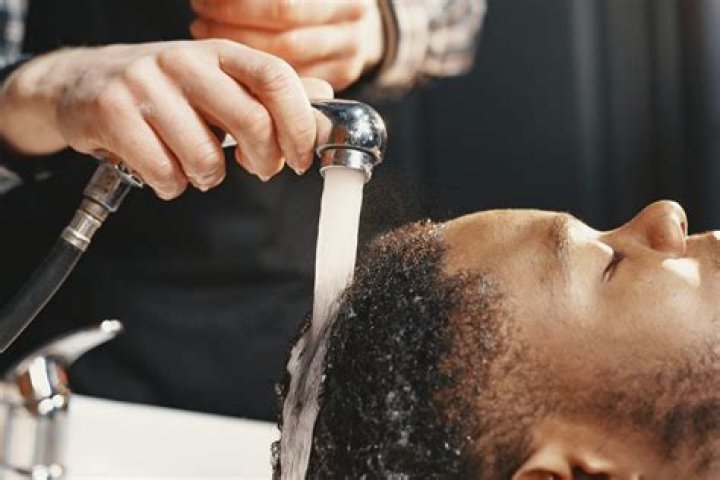 How do professionals wash their hair?