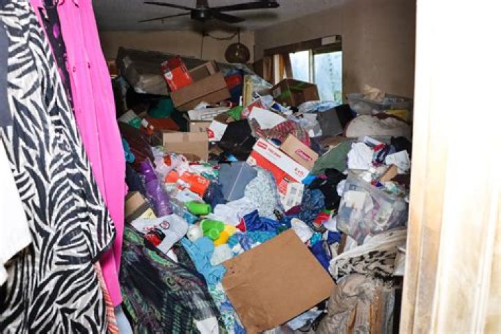 How do you clean a hoarder's house?