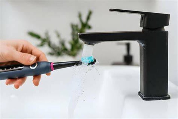 How do you disinfect a toothbrush?