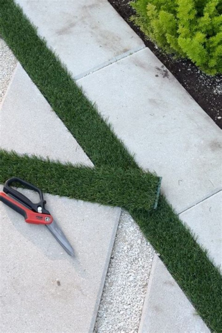 How do you lay artificial grass on a stone?