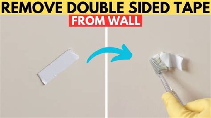 How do you remove double-sided tape without peeling paint?