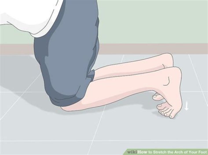 How do you stretch the arch of your foot?