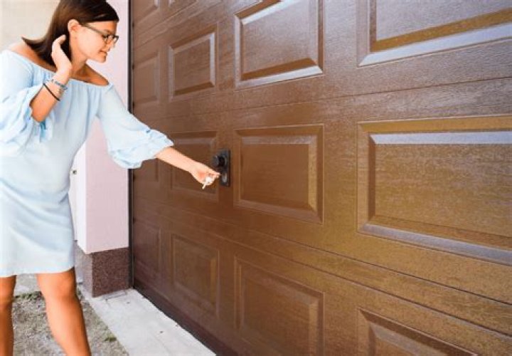 How do you unlock a garage door from the outside?