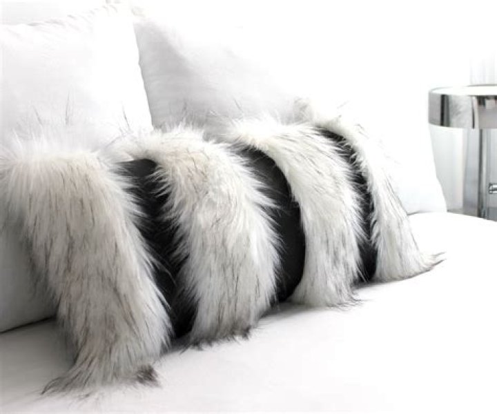 How do you wash polyester faux fur pillows?