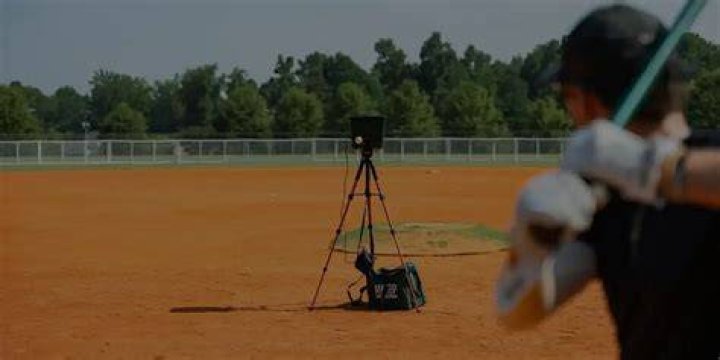How far is the pitching machine from home plate?