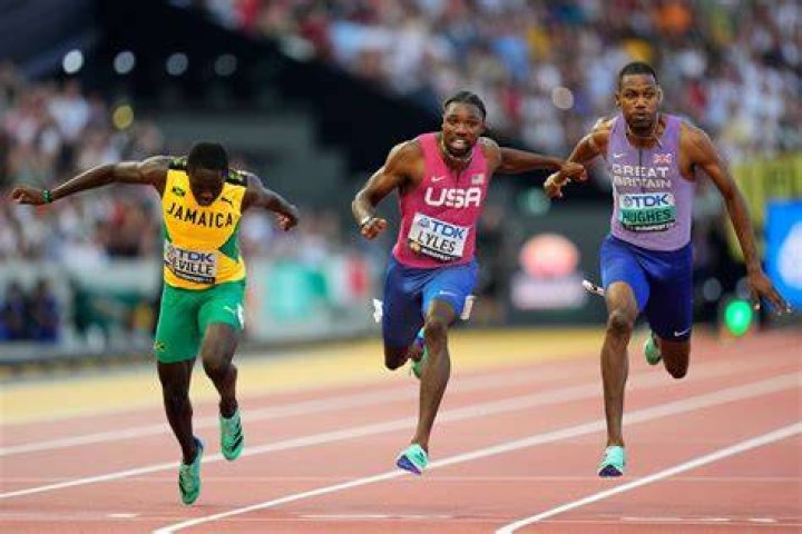 How is a runner disqualified in the 100-meter dash *?