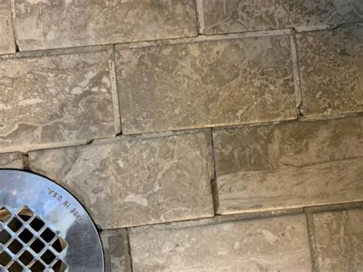How long can you leave grout haze on tile?