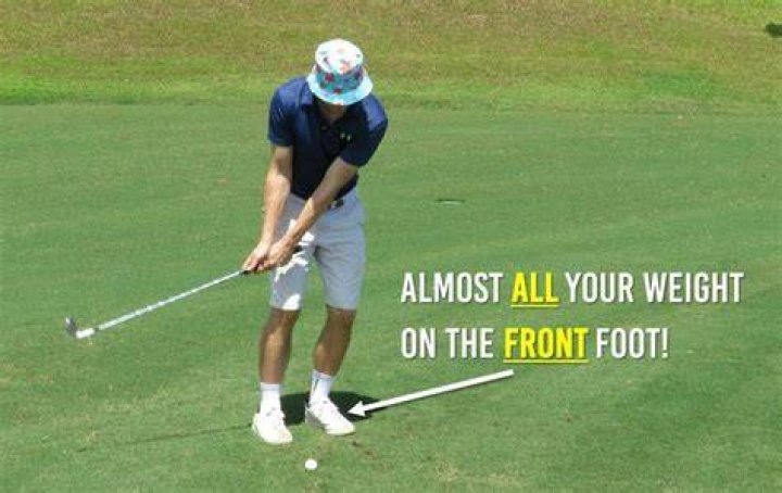 How much weight should be on your front foot in golf swing?
