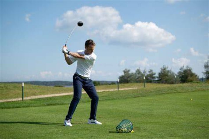 How often should I hit the driving range?