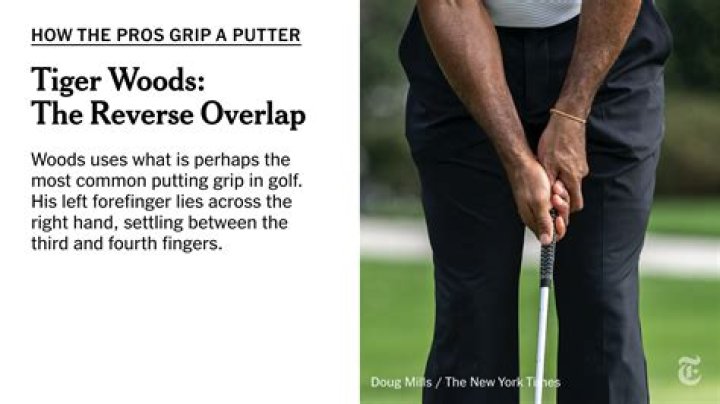 How Tiger Woods hold his putter?
