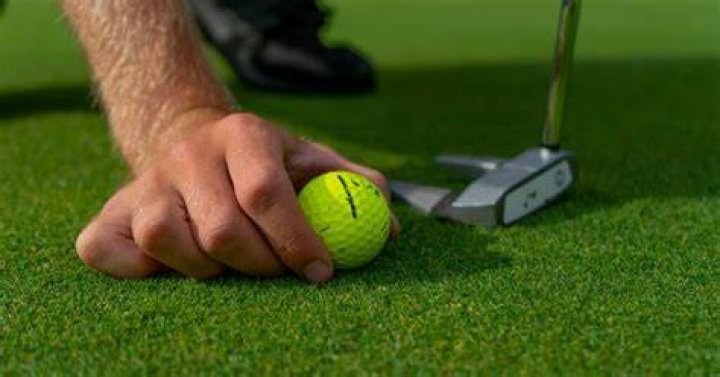 Is it legal to putt with a different ball?