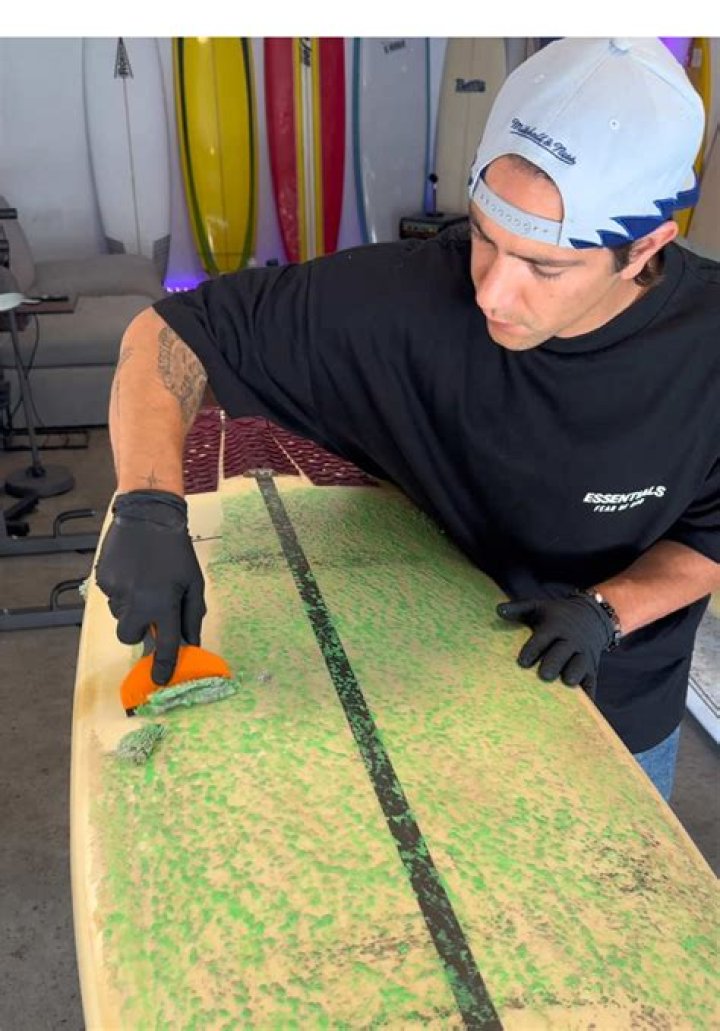 Should I remove old wax from surfboard?