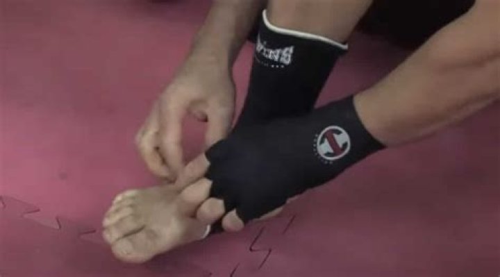 What do Muay Thai fighters wear on their feet?