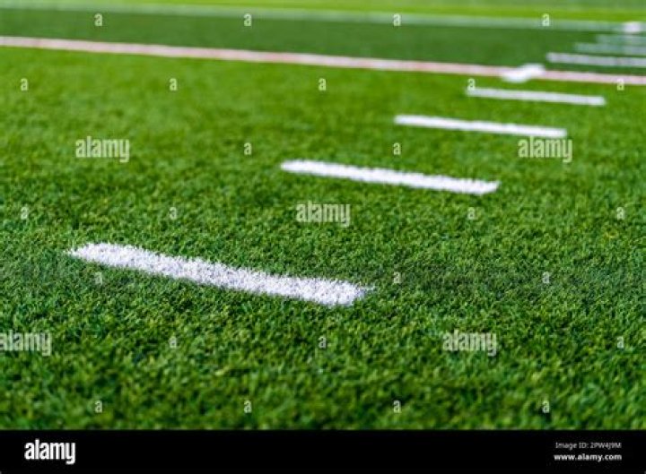 What do the hash marks on a football field represent?