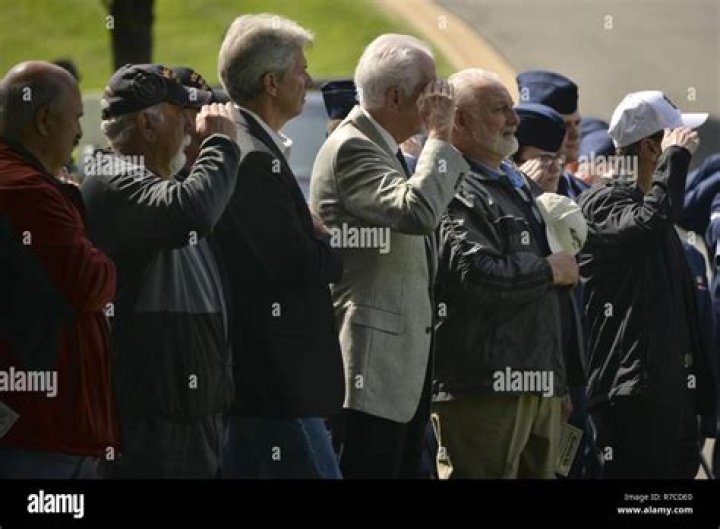 What do veterans do during the National Anthem?