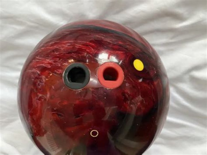 What does a yellow dot on a bowling ball mean?