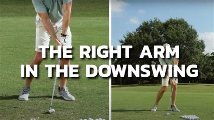What does the right arm do in the downswing?