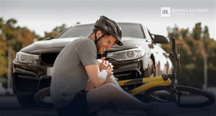 What happens if a cyclist hits your car in Ontario?