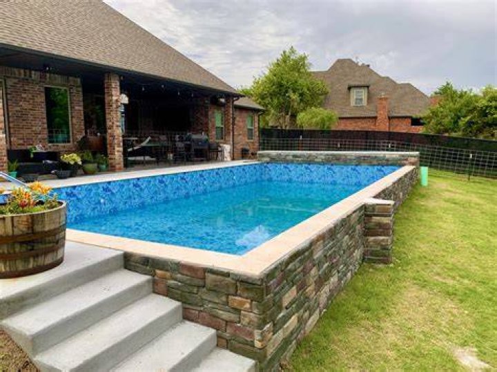 What is a semi inground pool?