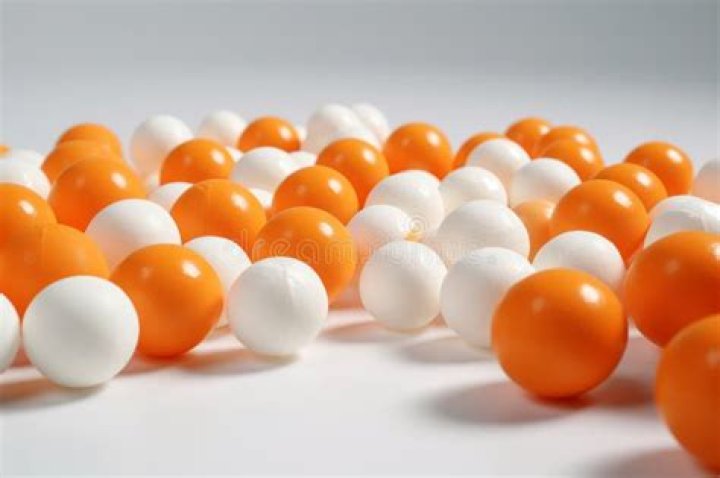 What is the difference between orange and white ping pong balls?