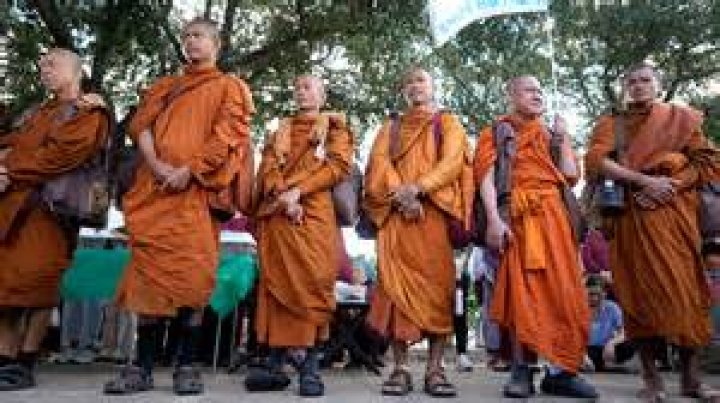 What time do Buddhist monks wake up?