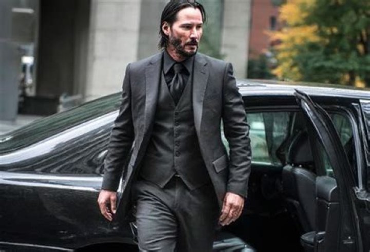What type of fighting style does John Wick use?