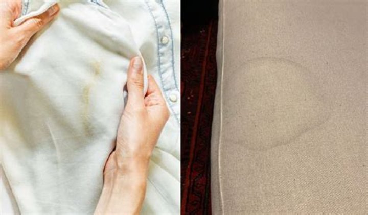 What will be the best way to remove the stains and spots caused by the candle?