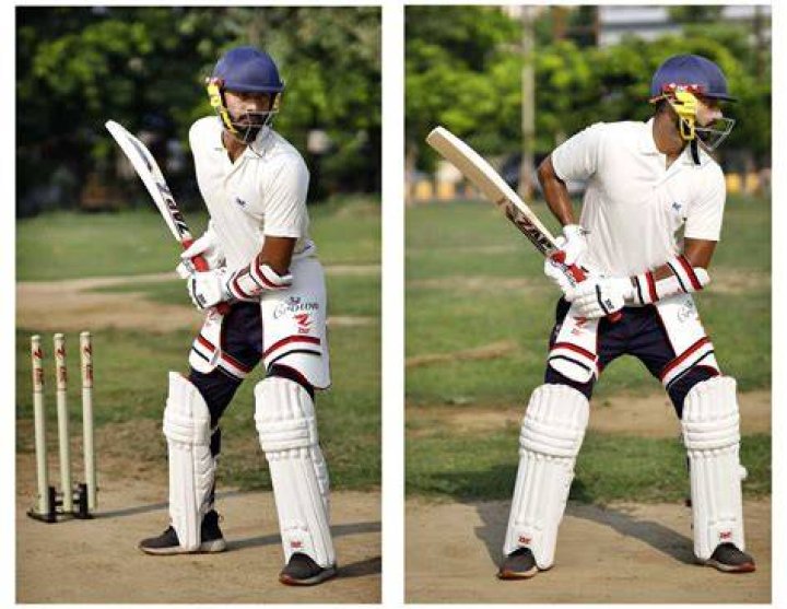 Where should hands be when batting?