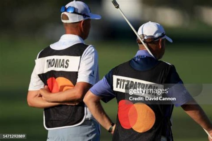 Who caddies for Justin Thomas?