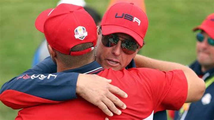 Who did Phil Mickelson hug?