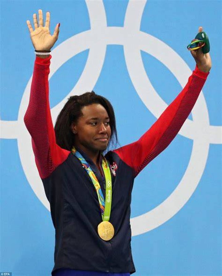 Who is the first African woman to win gold medal in Olympics?