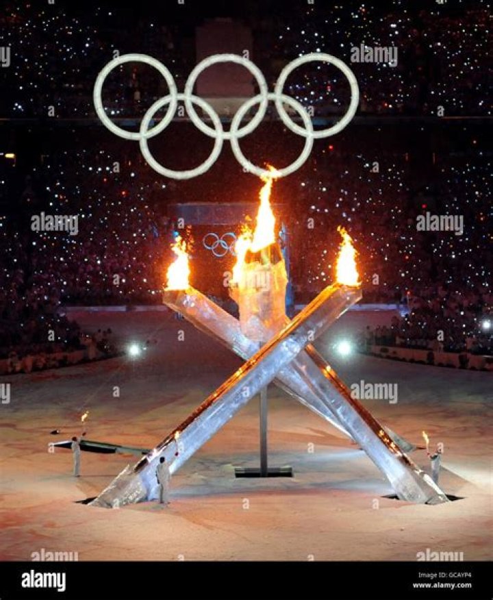 Who lit the Olympic torch 2000?