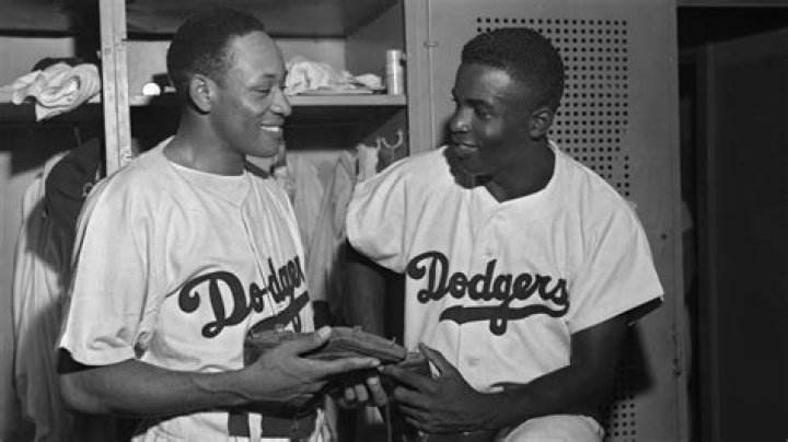 Who was the next black baseball player after Jackie Robinson?