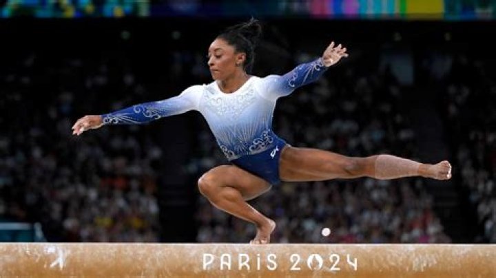 Who would replace Simone in beam finals?