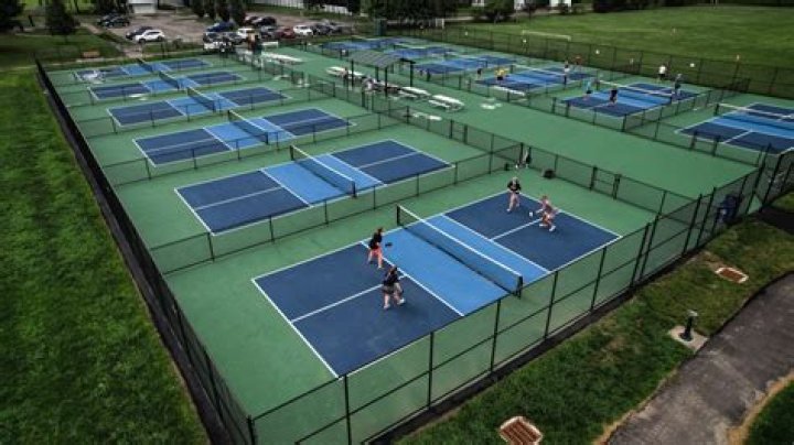 Why are tennis courts always north-south?
